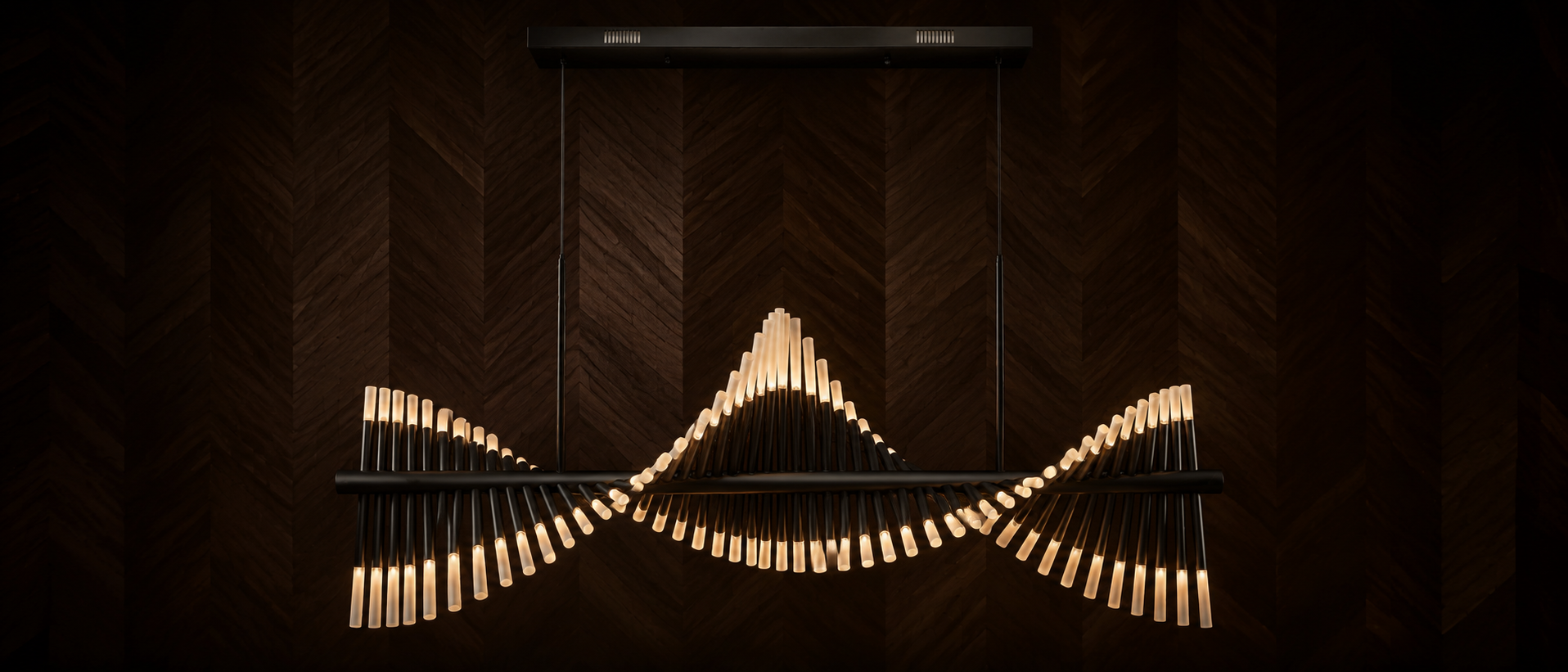 Modern chandelier with geometric design on a dark background