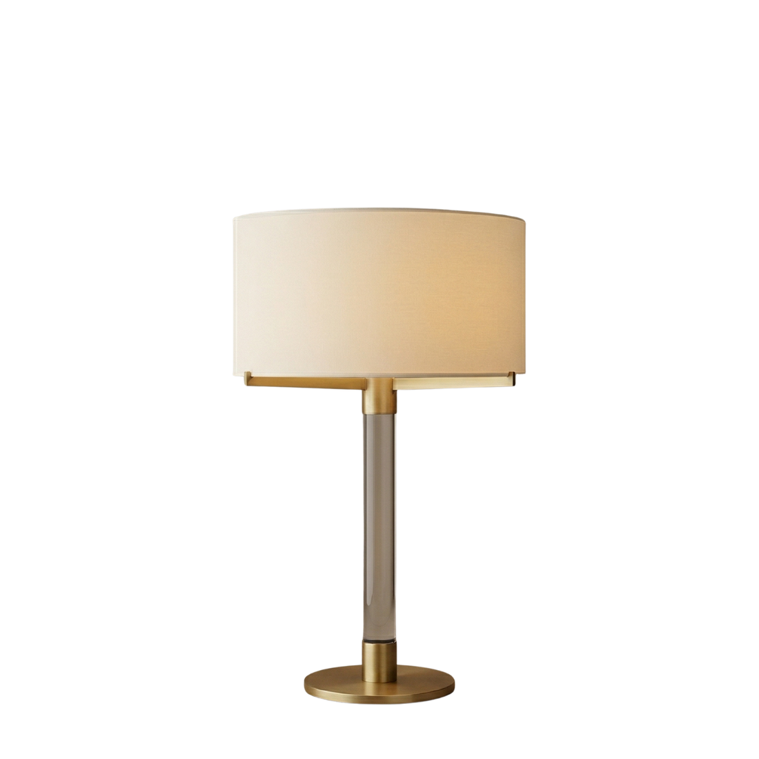 Table lamp with beige shade and metallic base on a white background